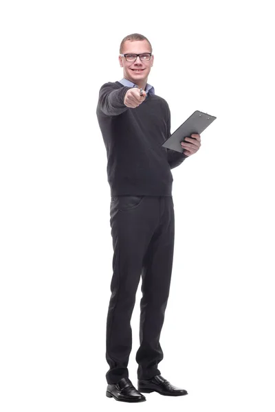 Handsome young business man showing a clipboard pointing with finger to the camera and to you, hand sign — Stock Photo, Image