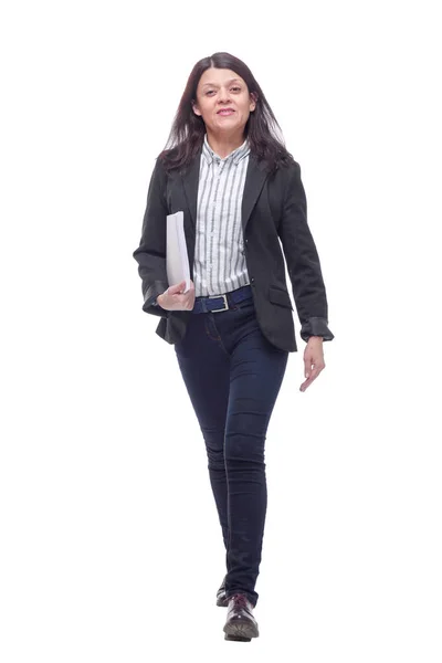 Happy cheerful businesswoman holding documents walking isolated on white — Stock Photo, Image