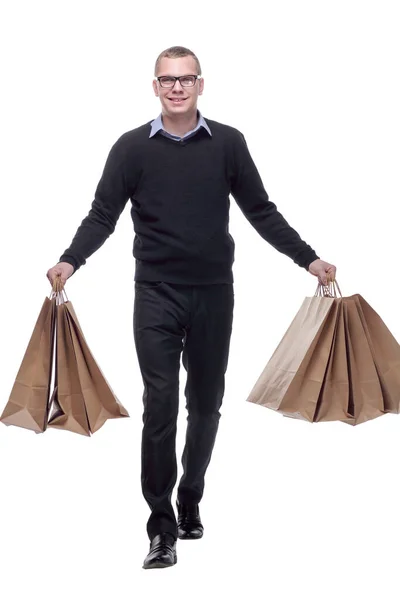 Mladý podnikatel s nákupní taškou chůze — Stock fotografie
