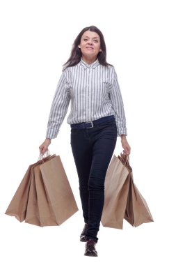 Alışveriş torbaları tutan çekici bir iş kadını.