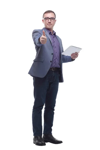 Young business man holding a tablet and showing thumb up while smiling to the camera — Stock Photo, Image