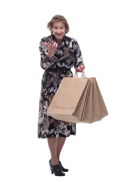 Full body senior woman cheerful and smiling, very excited carrying a shopping bags, ready to go shopping — Stock Photo, Image