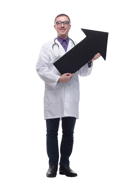 Vista frontal del médico sosteniendo una flecha negra apuntando a la derecha —  Fotos de Stock