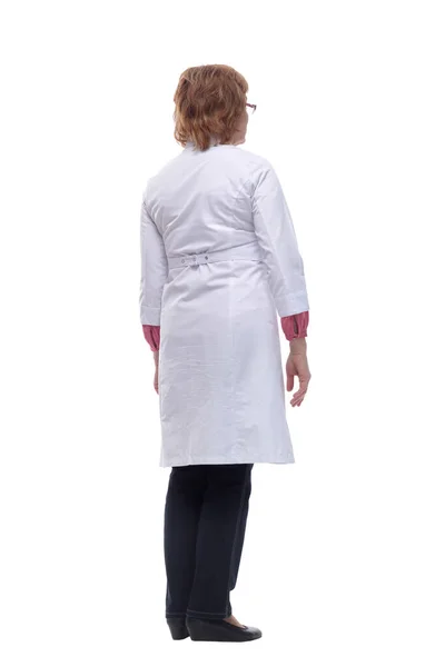 Full body shot profile view of mature woman wearing stethoscope and uniform doctor — Stock Photo, Image