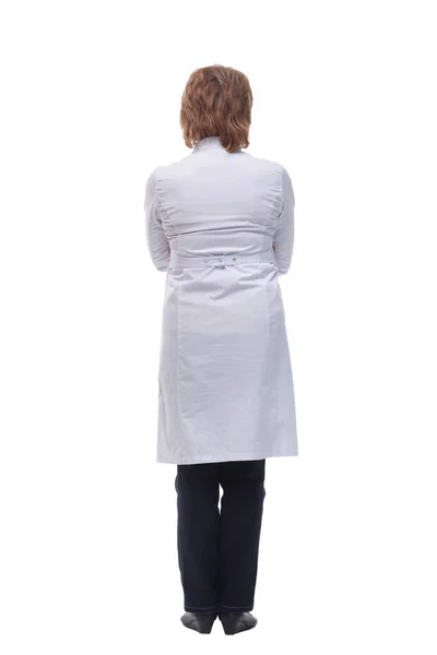 Baksida bild av en kvinnlig läkare tittar på vitt — Stockfoto