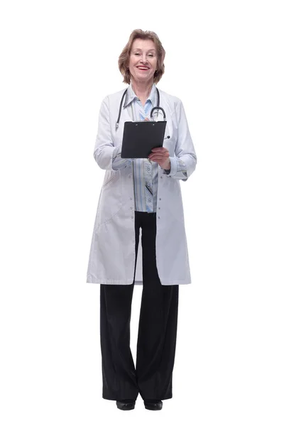 Happy doctor with stethoscope writing on clipboard, isolated — Stock Photo, Image