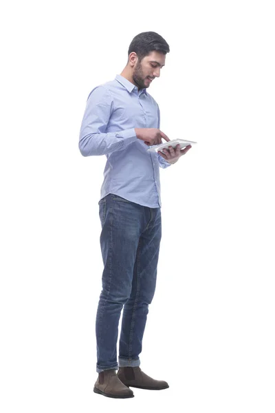 Side view. young man using his digital tablet. — Stock Photo, Image