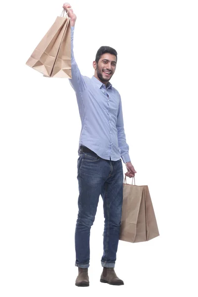 In full growth. happy man showing his purchases. — Stock Photo, Image