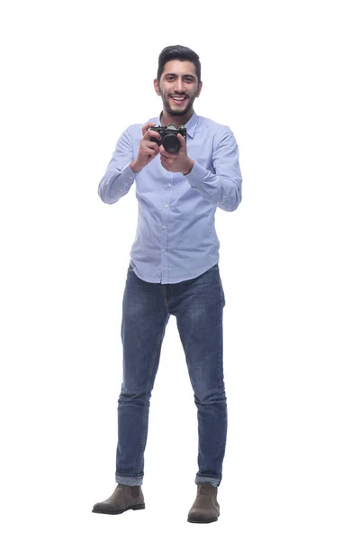 V plném růstu. usmívající se mladý muž s fotoaparátem. — Stock fotografie