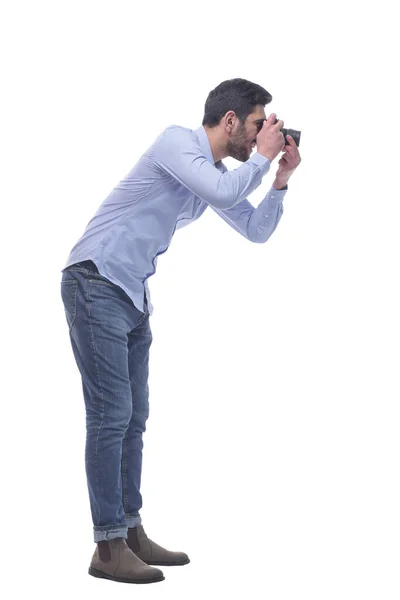 Вид сбоку. мужчина-фотограф с камерой. — стоковое фото