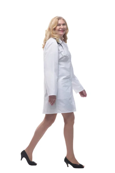 Confident female doctor stepping forward . isolated on white background. — Stock Photo, Image