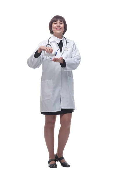 Kvinnlig läkare med saneringsmedel. isolerad på en vit bakgrund. — Stockfoto