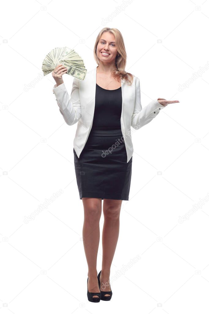 businesswoman with a large wad of bills. isolated on a white background.