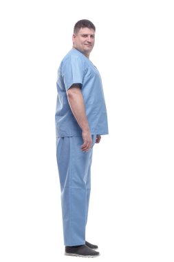 Yan görünüş. Mavi üniformalı bir erkek doktor. .