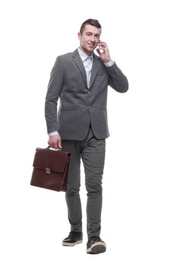 Tam gelişim. Akıllı telefonlu çekici bir iş adamı..