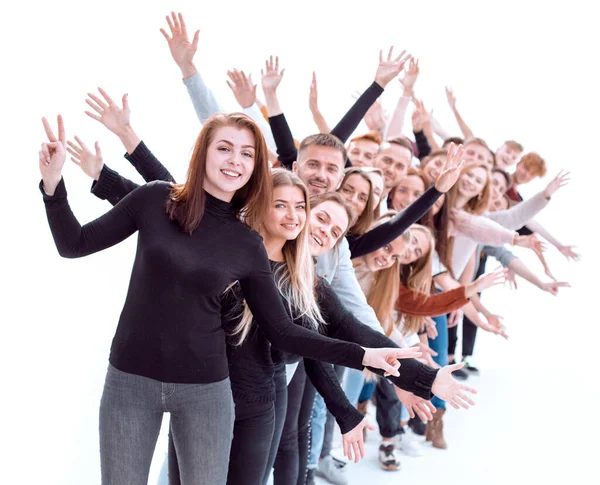 Confident guy standing first in the column of young people — Stock Photo, Image