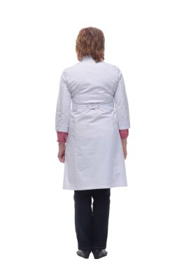 Beyazlara bakan bir kadın doktorun arka planı.