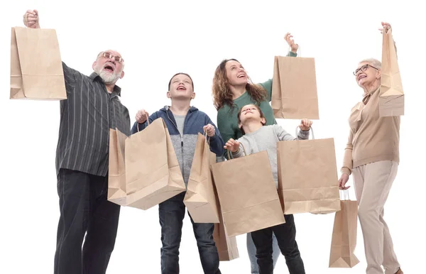 W pełnym wzroście. rodzina z torbami na zakupy . — Zdjęcie stockowe