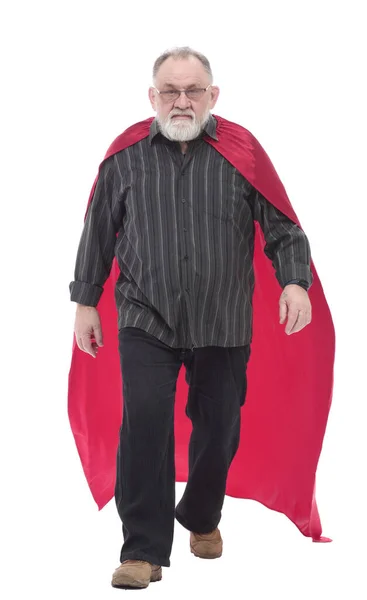 In full growth. Mature man in a superhero Cape striding forward. — Stock Photo, Image
