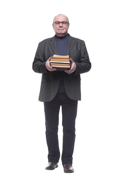 In full growth. senior business man with a stack of books — Stock Photo, Image