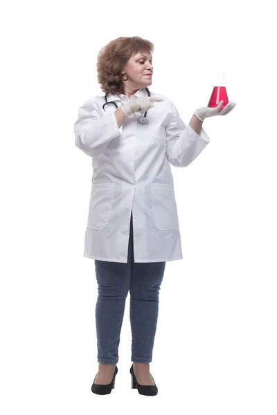 In full growth. a female therapist holds a laboratory flask — Stock Photo, Image