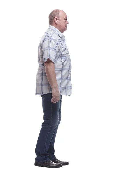 Vista lateral. un hombre con una camisa de verano mirando una pantalla blanca en blanco —  Fotos de Stock