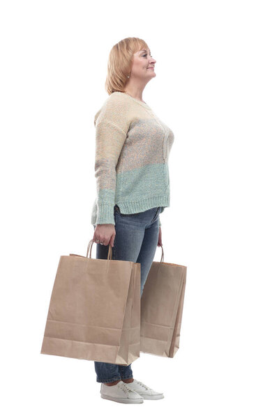 in full growth. attractive casual woman with shopping bags .