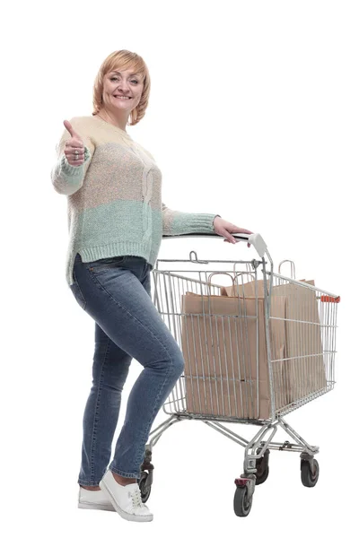 In vollem Wachstum. attraktive lässige Frau mit Einkaufswagen . — Stockfoto