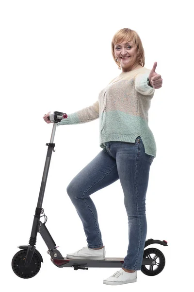 In full growth. attractive casual woman with electric scooter. — Stock Photo, Image