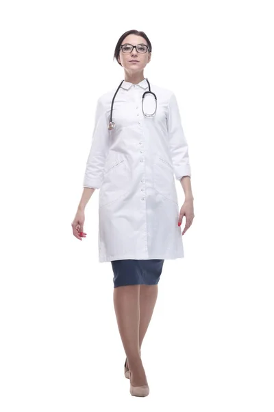 Confident female doctor with a stethoscope striding forward. — Stock Photo, Image