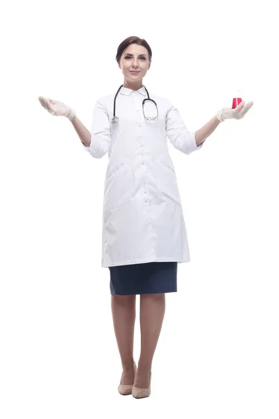 Female doctor with a laboratory flask in her hands. — Stock Photo, Image