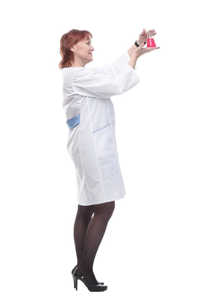 Em pleno crescimento. mulher médica com um frasco de laboratório . — Fotografia de Stock