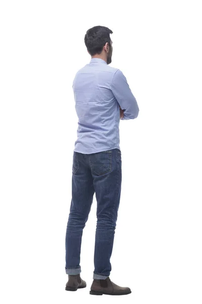 Side view . casual young man reading an ad on a white screen. — Stock Photo, Image