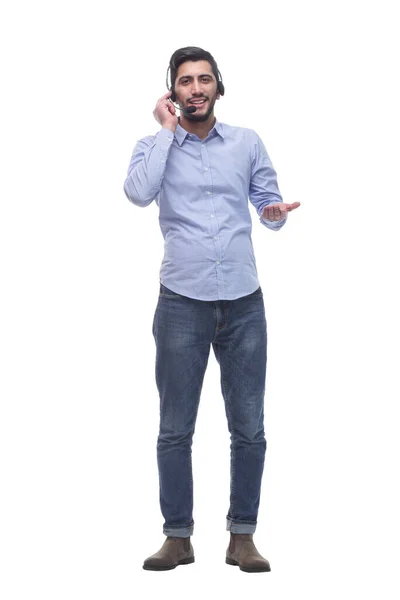 En pleno crecimiento. joven en un auricular mirando una pantalla blanca. —  Fotos de Stock