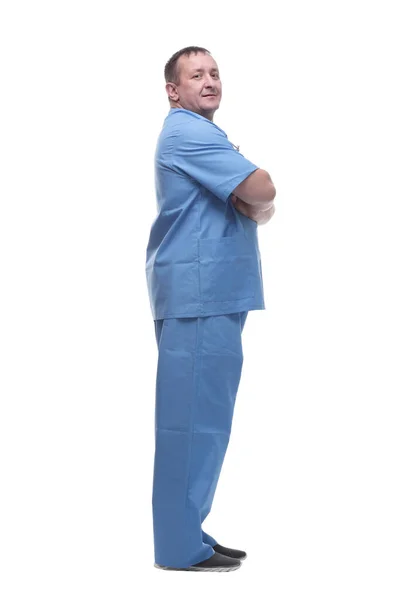 Kompetent, mogen sjukvårdare som tittar på dig. isolerad på vit bakgrund. — Stockfoto