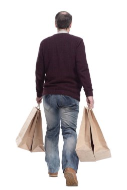 Tam boy. Alışveriş çantalı sıradan bir adam. bir beyaz üzerinde izole