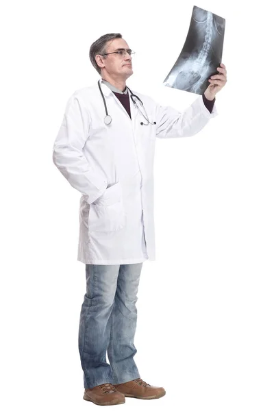 In full growth. qualified doctor looking at an x-ray. — Stock Photo, Image