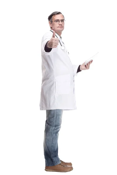 In full growth.qualified doctor with a digital tablet. Stock Picture