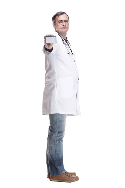 Full-length. qualified doctor showing his visiting card. Stock Picture