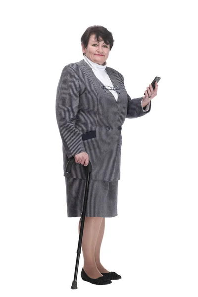 Teljes növekedésben. magabiztos idős nő egy sétapálca. — Stock Fotó