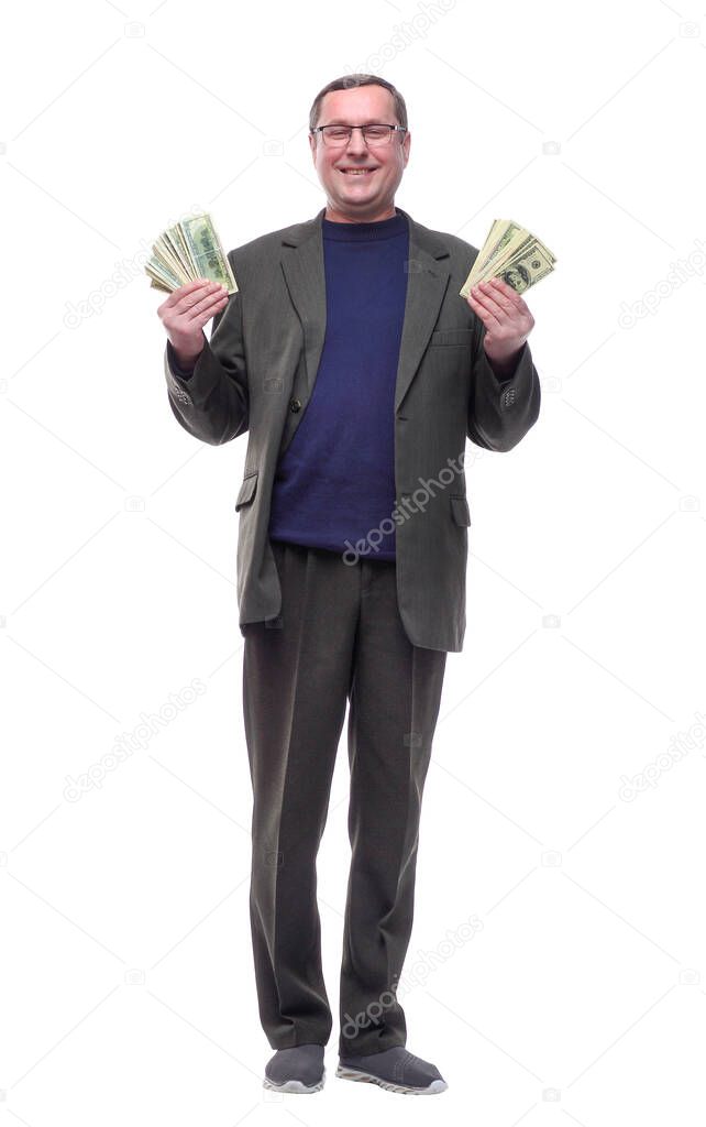 full-length. casual man showing a bundle of banknotes.