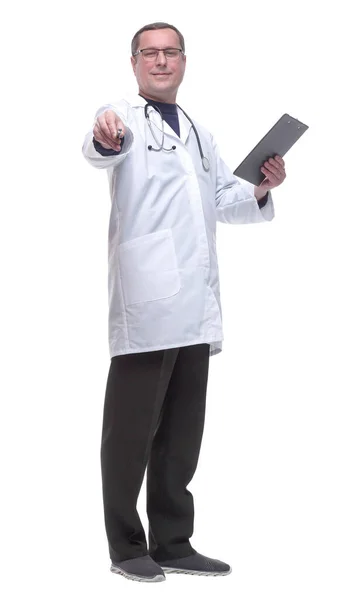 In full growth. doctor with a stethoscope taking notes in the clipboard. — Stock Photo, Image