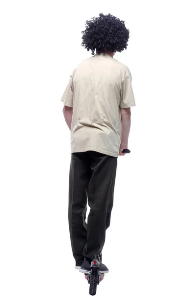 In volle groei. een man in een licht t-shirt die naar voren schuift. — Stockfoto