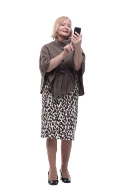 Tam gelişim. Akıllı telefonlu çekici olgun bir kadın. .