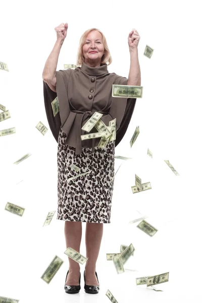 Gelukkig volwassen vrouw staan in de regen van dollar biljetten. — Stockfoto