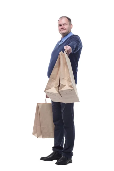 In full growth. casual mature man with shopping bags. — Stock Photo, Image