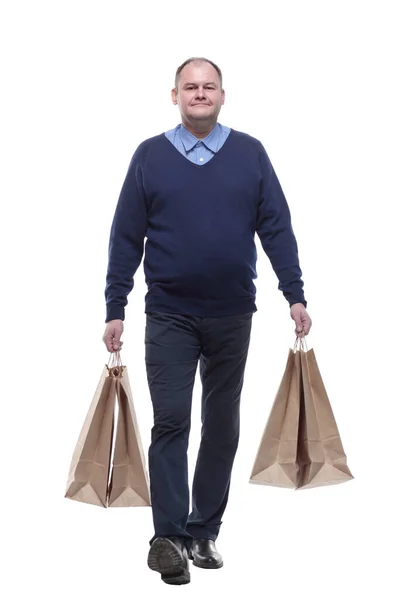 In full growth. casual mature man with shopping bags. — Stock Photo, Image