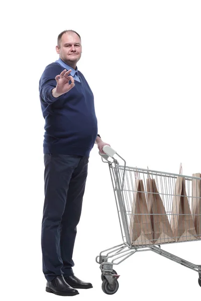 Em pleno crescimento. homem maduro casual com carrinho de compras. — Fotografia de Stock