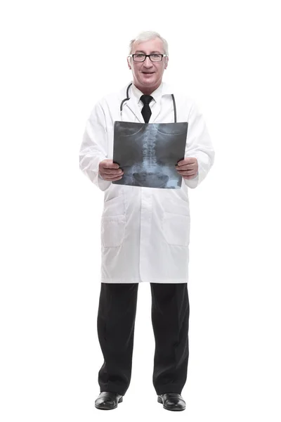 Full-length. qualified mature doctor looking at the x-ray. — Stock Photo, Image