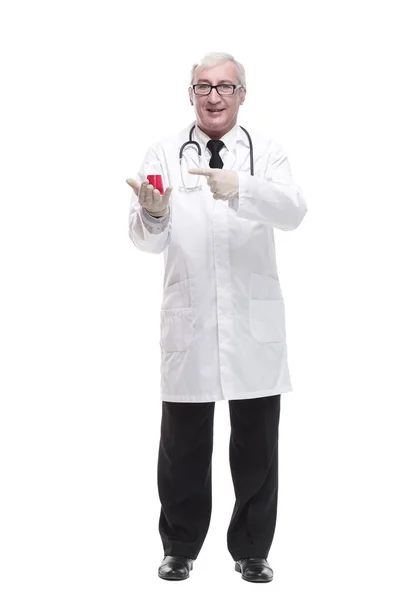 Full-length. mature doctor with a laboratory flask in his hands . — Stock Photo, Image